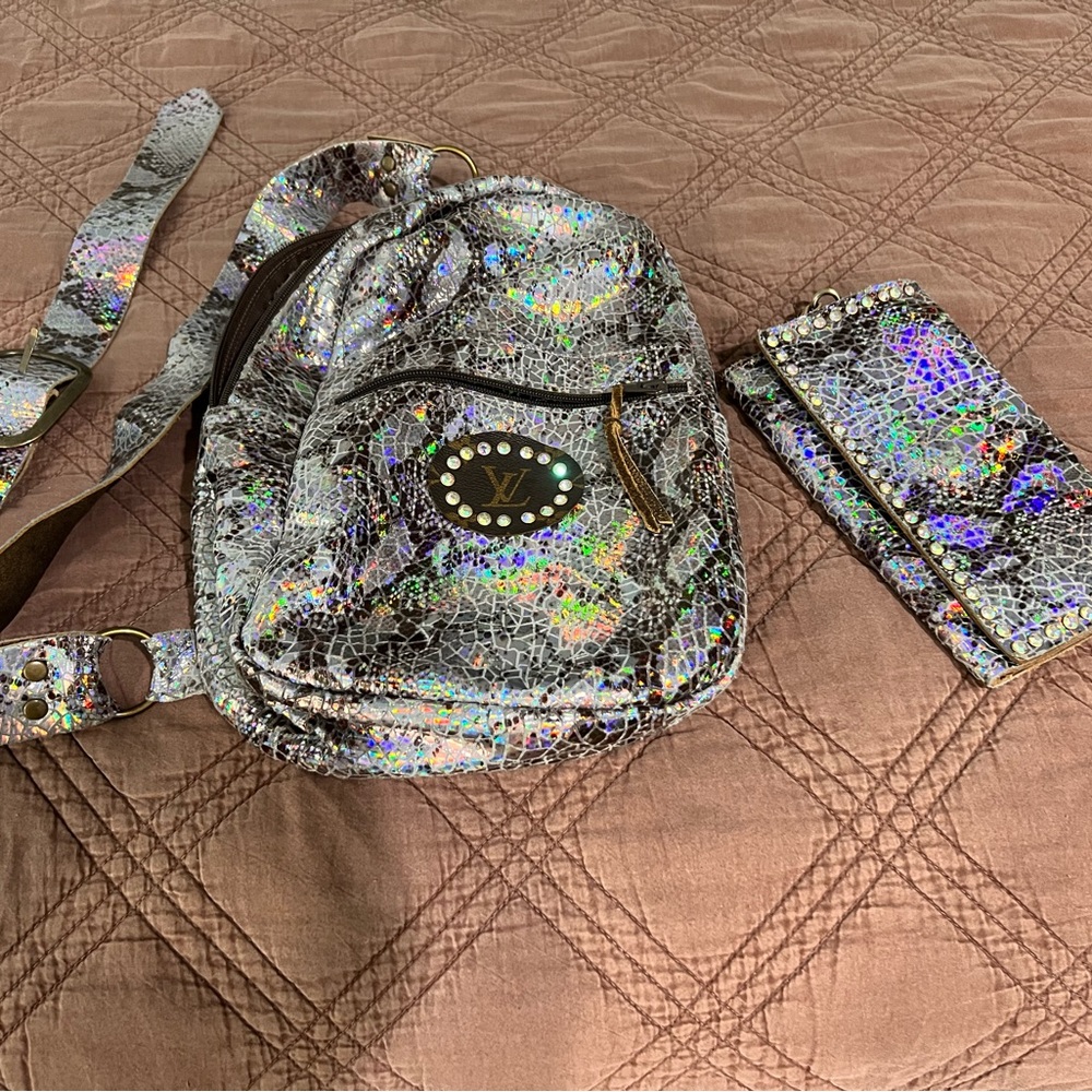 Keep it Gypsy with Louis Vuitton Holographic Cracked Pattern Backpack and Wallet